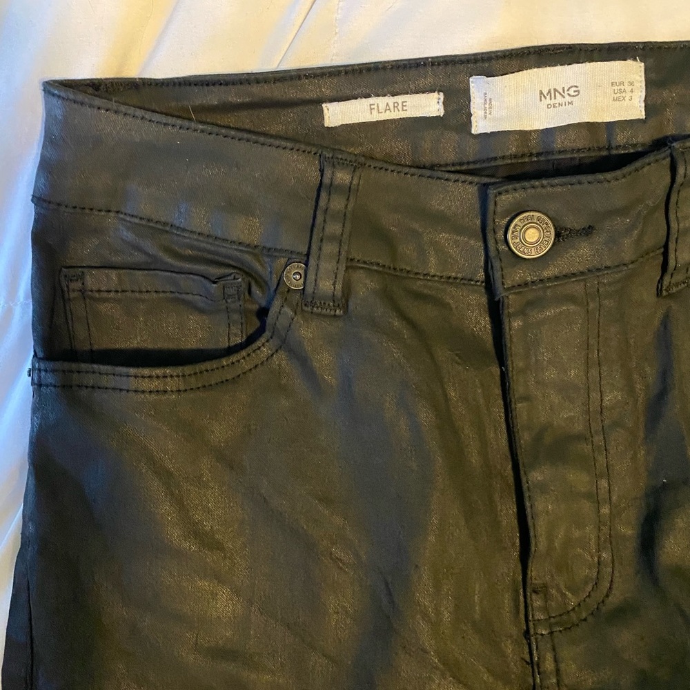 Bought in Italy! Worn once. Black faux leather flare pants